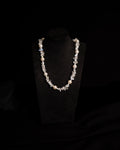 The Luminous Pearl Necklace